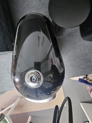 Cafetera Nespresso vertuo plus.