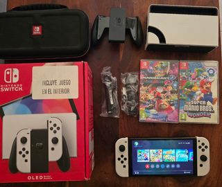 Nintendo switch oled con juegos y funda