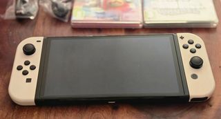 Nintendo switch oled con juegos y funda
