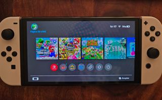 Nintendo switch oled con juegos y funda