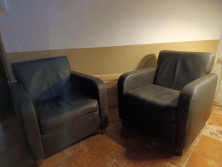 Juego de dos sillones de piel de diseño