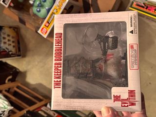 The Evil Within Box Head Keeper Bobblehead Figure
