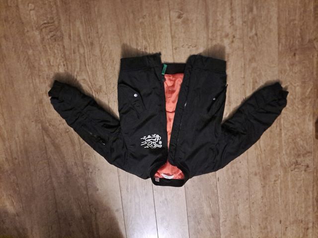 Abrigo T10 Keith Haring