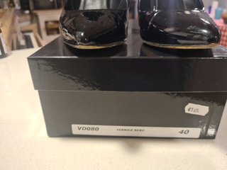 Decolte tacco 12 vernice nera pelle