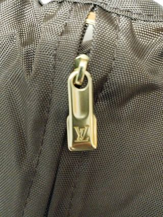 Portatrajes plegable. Louis vuitton