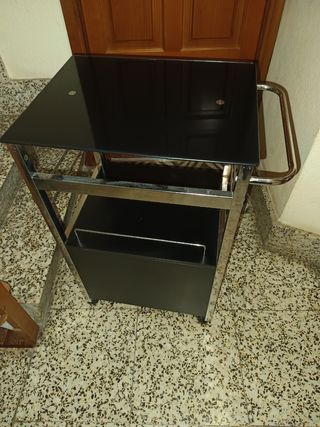 Camarera acero y cristal 
