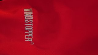 Chaqueta cortavientos mujer roja