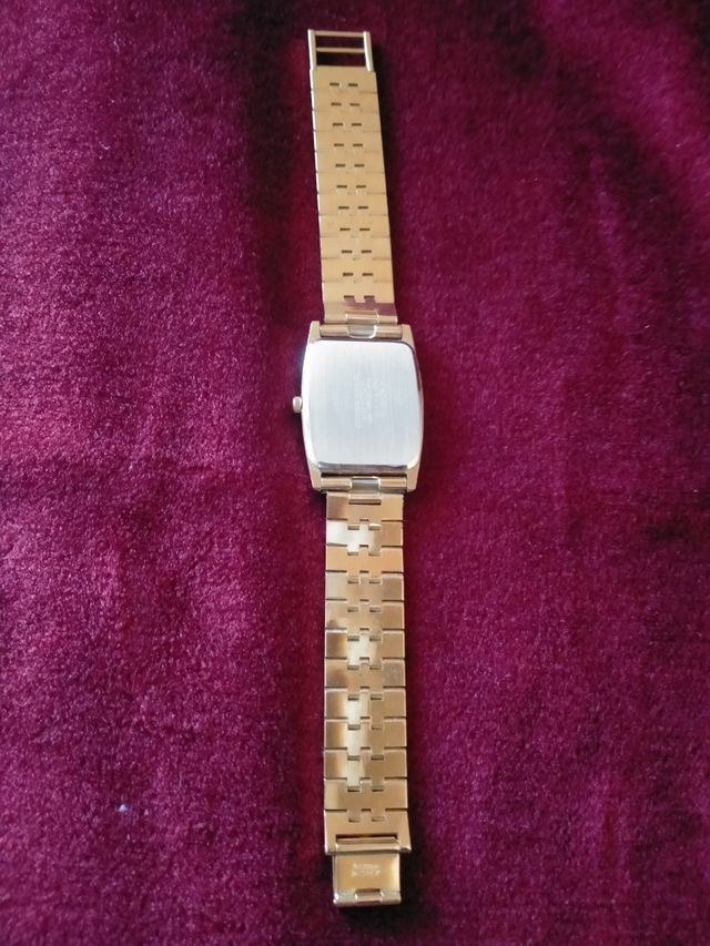 Citizen. Reloj con pulsera dorado caballero