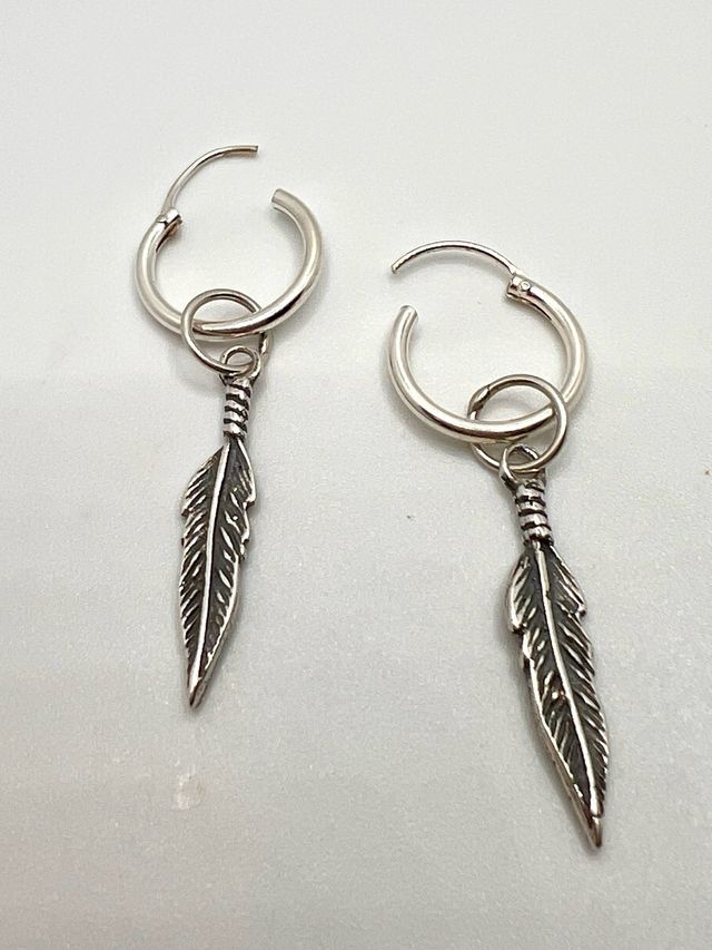 Aros plata con pluma