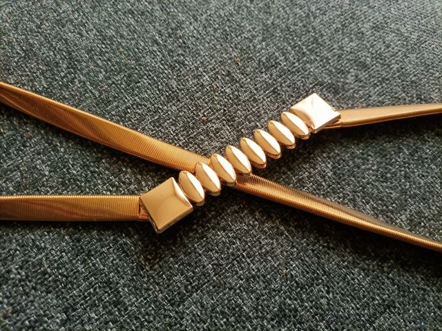 Cinturón extensible dorado