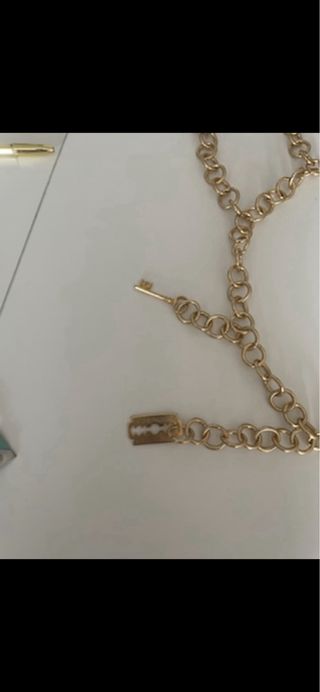 Denny Rose ci tura con perle e charms