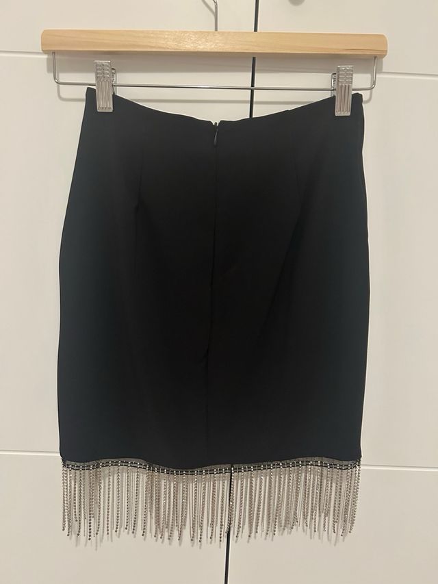 Falda negra brillos