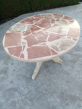Mesa ovalada de exterior de piedra