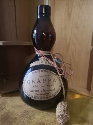 Bottiglia vecchia grappa carpené