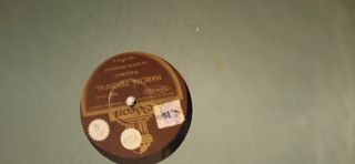 Álbum con 12 discos de pizarra.