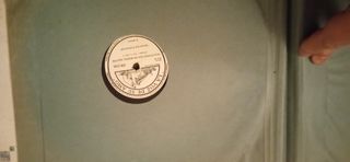 Álbum con 12 discos de pizarra.