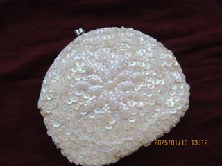 Bolso de fiesta con perlas