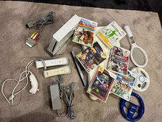 Wii completa con accesorios juegos y balance board