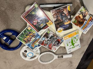 Wii completa con accesorios juegos y balance board