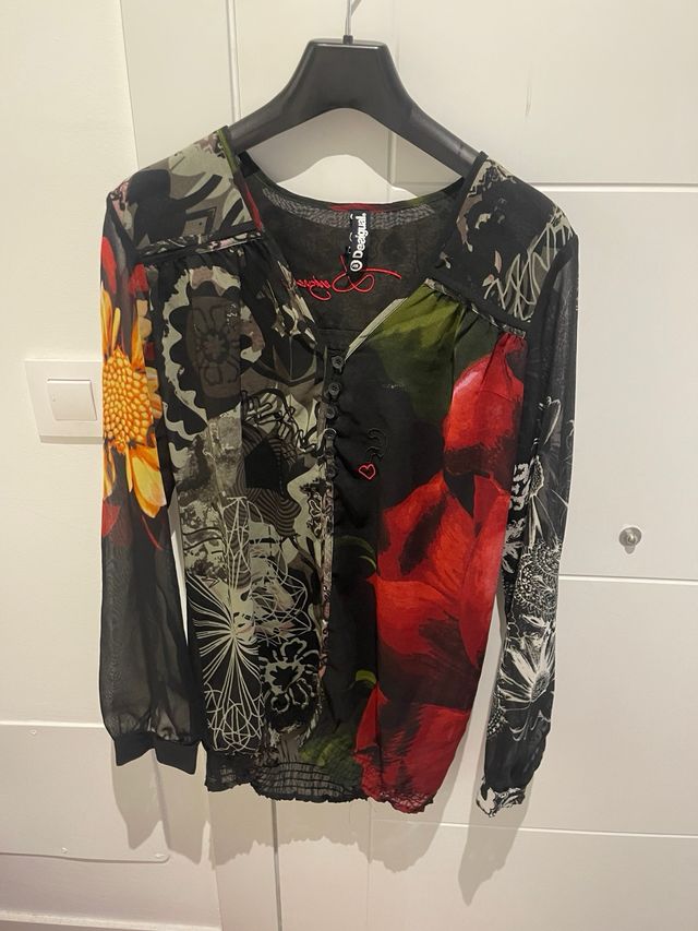 Blusa desigual talla M