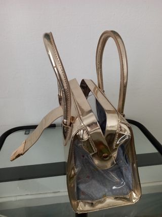 Bolso dorado mujer