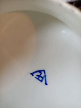 Tetera antigua de porcelana