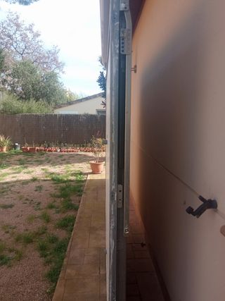 Puerta parking vasculante