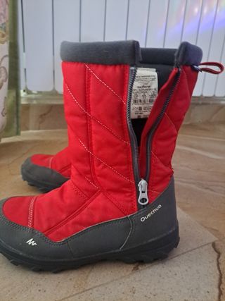 Botas de nieve  rojas de niño