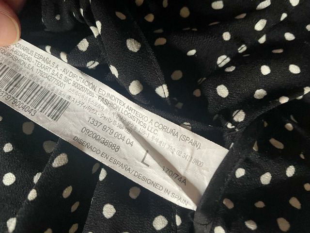 Falda color negro con topos blancos