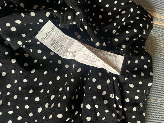 Falda color negro con topos blancos