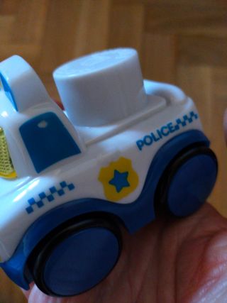 Camión de molto, tapiz y coches