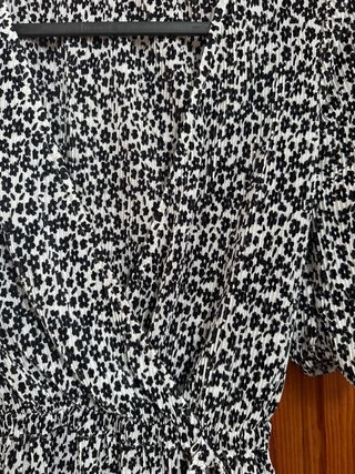 Top abertura de pico con mangas