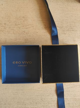 Caja y bolsa oro vivo