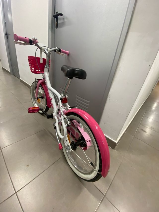 Bicicleta niña rosa  btwin doctor girl con cesta