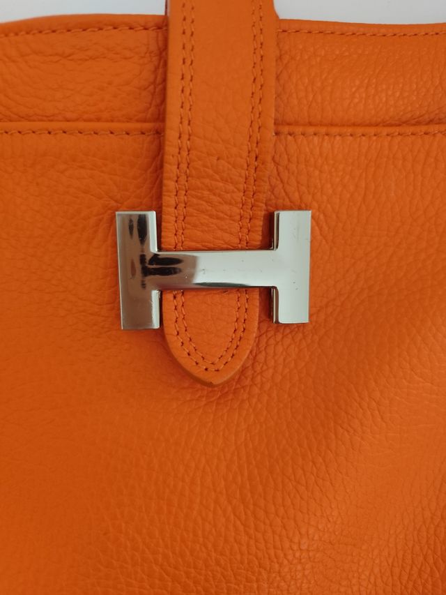 Bolso piel Naranja,butano.