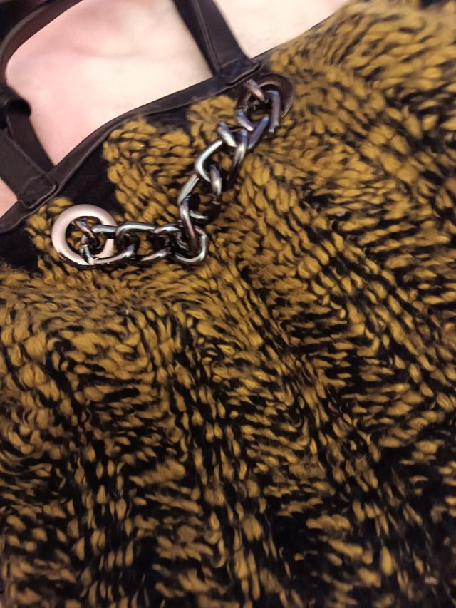 Bolso en tonos verdosos y negro