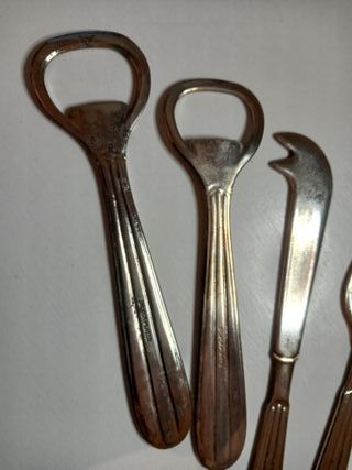 Apribottiglie e coltelli da formaggio placcati arg