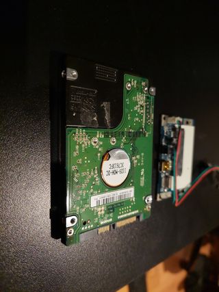 Disco Duro SATA 2,5" 169 Gb y adaptador USB
