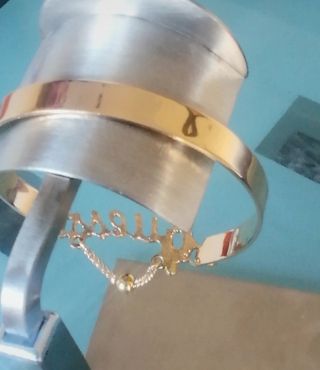 Pulsera brazalete doradas Guess 