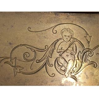 Antica cariola giocattolo in rame cesellata