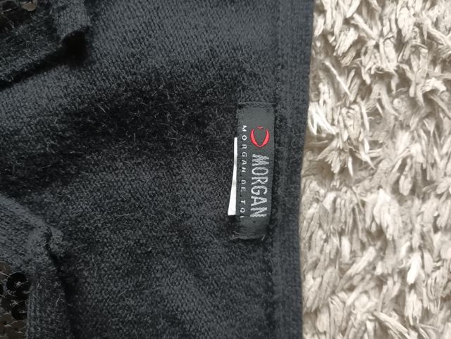 Bolero preto de malha com lantejoulas