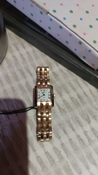 Reloj Lotus chapado en oro