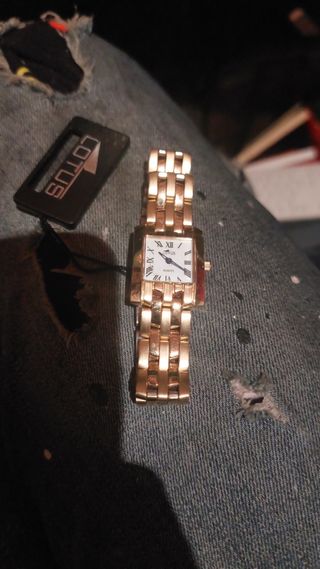 Reloj Lotus chapado en oro