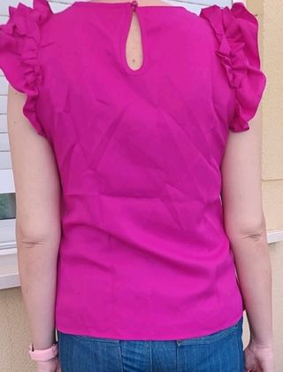 Blusa suelta volantes rosa fucsia 