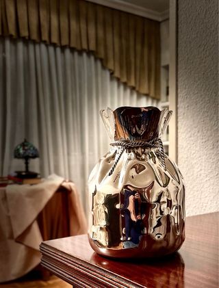 Jarrón vintage plateado.