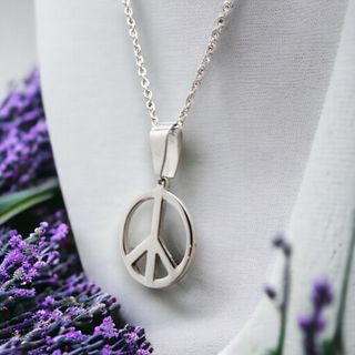 Colgante signo de la Paz en acero con cadena .