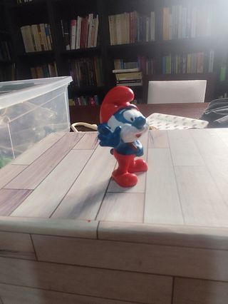 Figura de papá pitufo con bolsa.