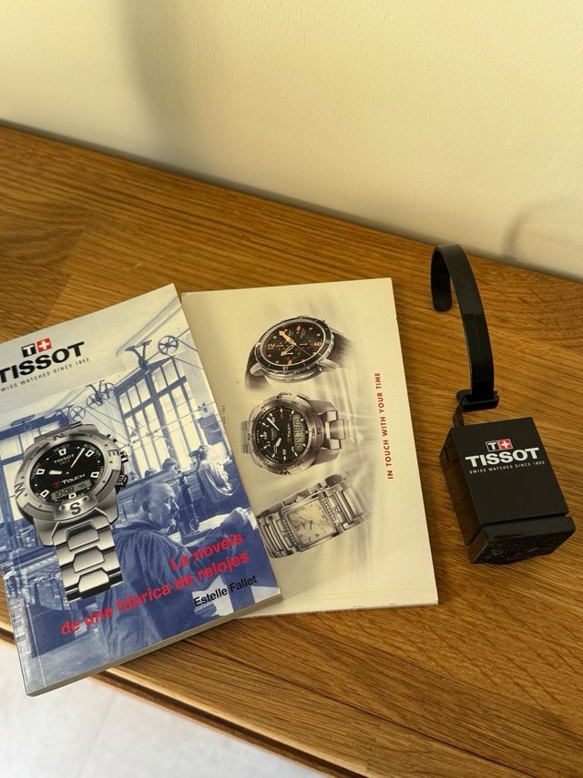 Soporte reloj Tissot + dos libros