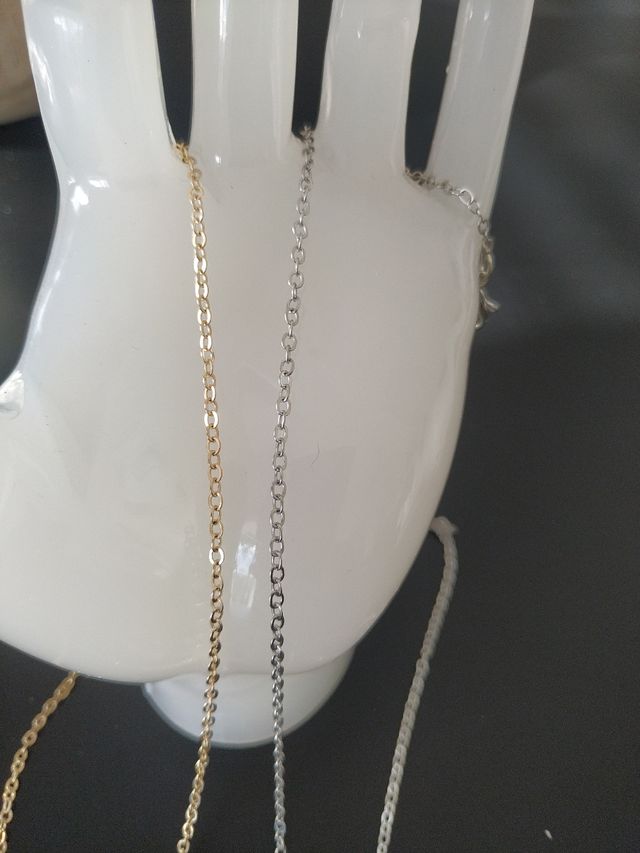 Lote collares con Cruz y pulseras