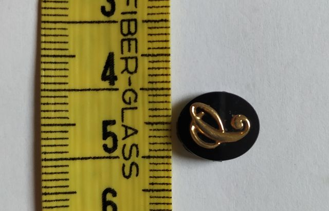 Letra C oro y Onix negro